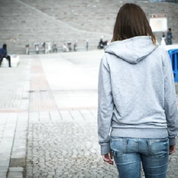 lonely girl in the city in danger