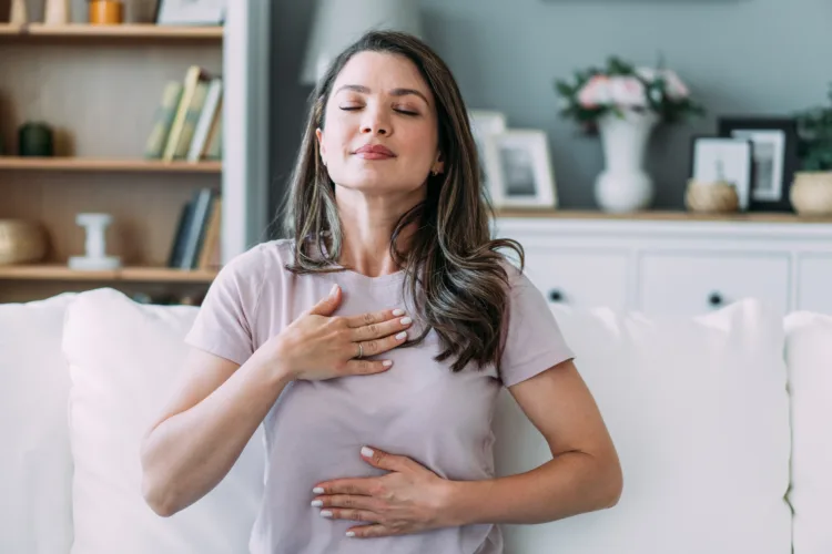 a woman practicing how to stop ruminating or intrusive thoughts